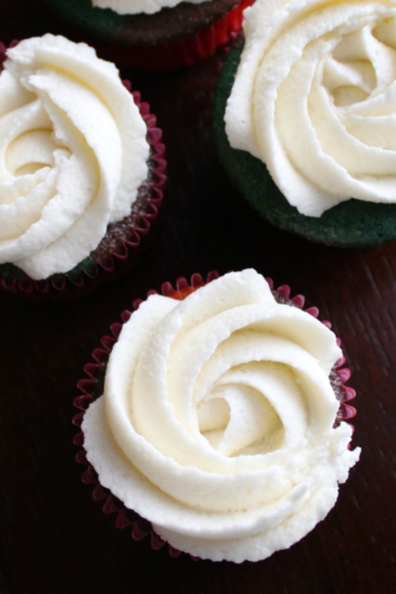 cream cheese frosting rosettes on cupcakes.