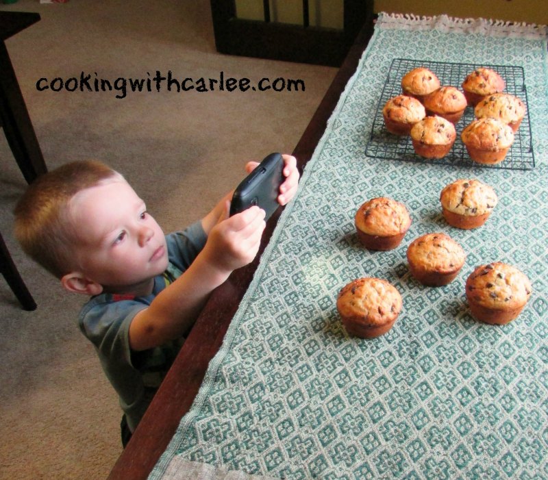 Small child taking a picture of chocolate chip sourdough muffins, a behind the scenes look at how things are at our house.