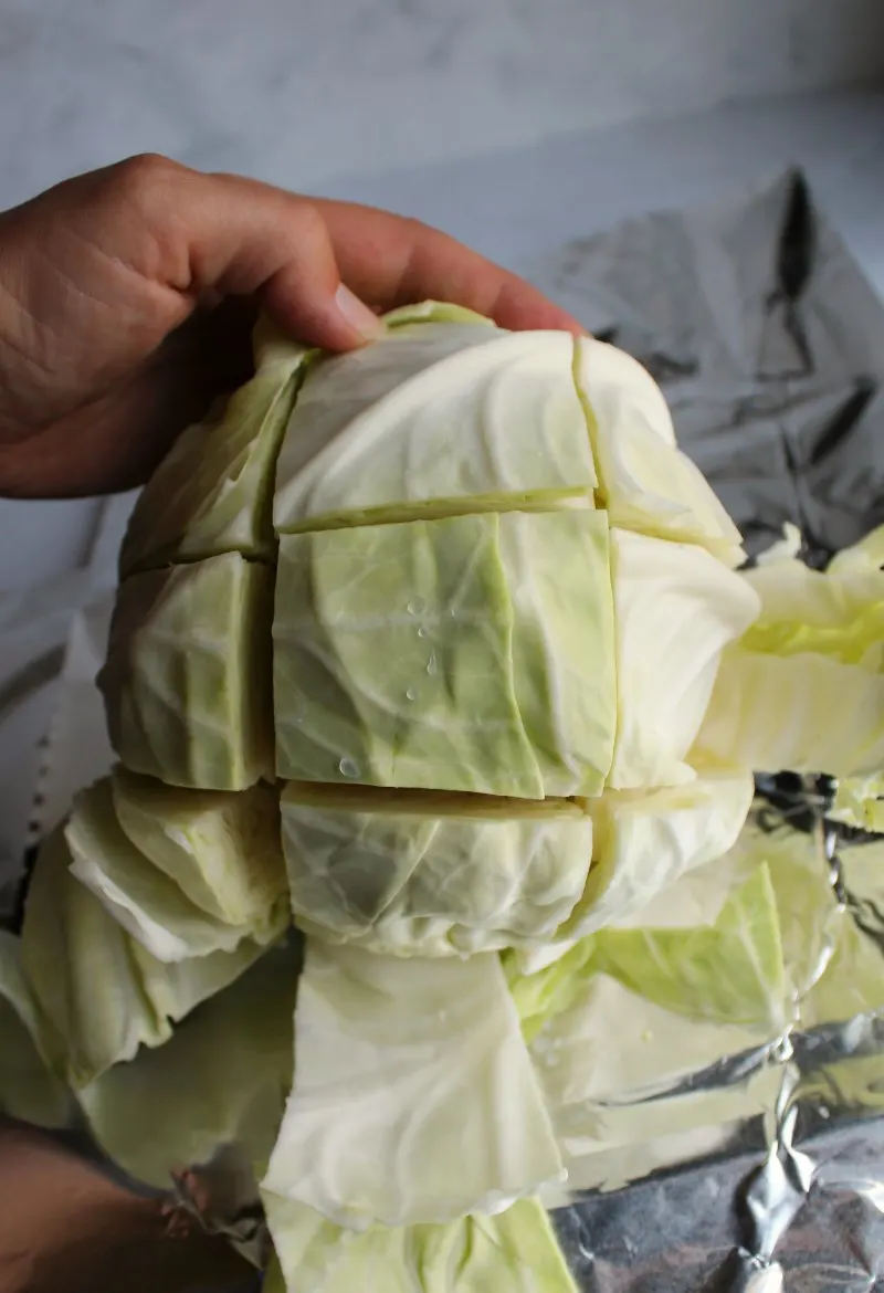 head of cabbage cut into squares by cutting two slits each direction 