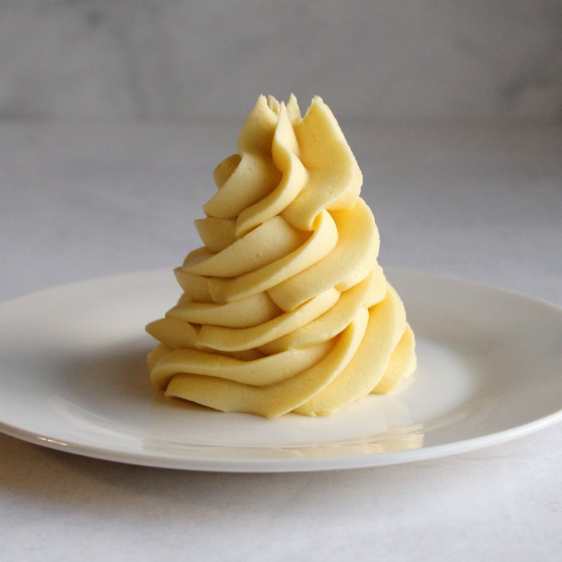 swirls of creamy golden custard based german buttercream