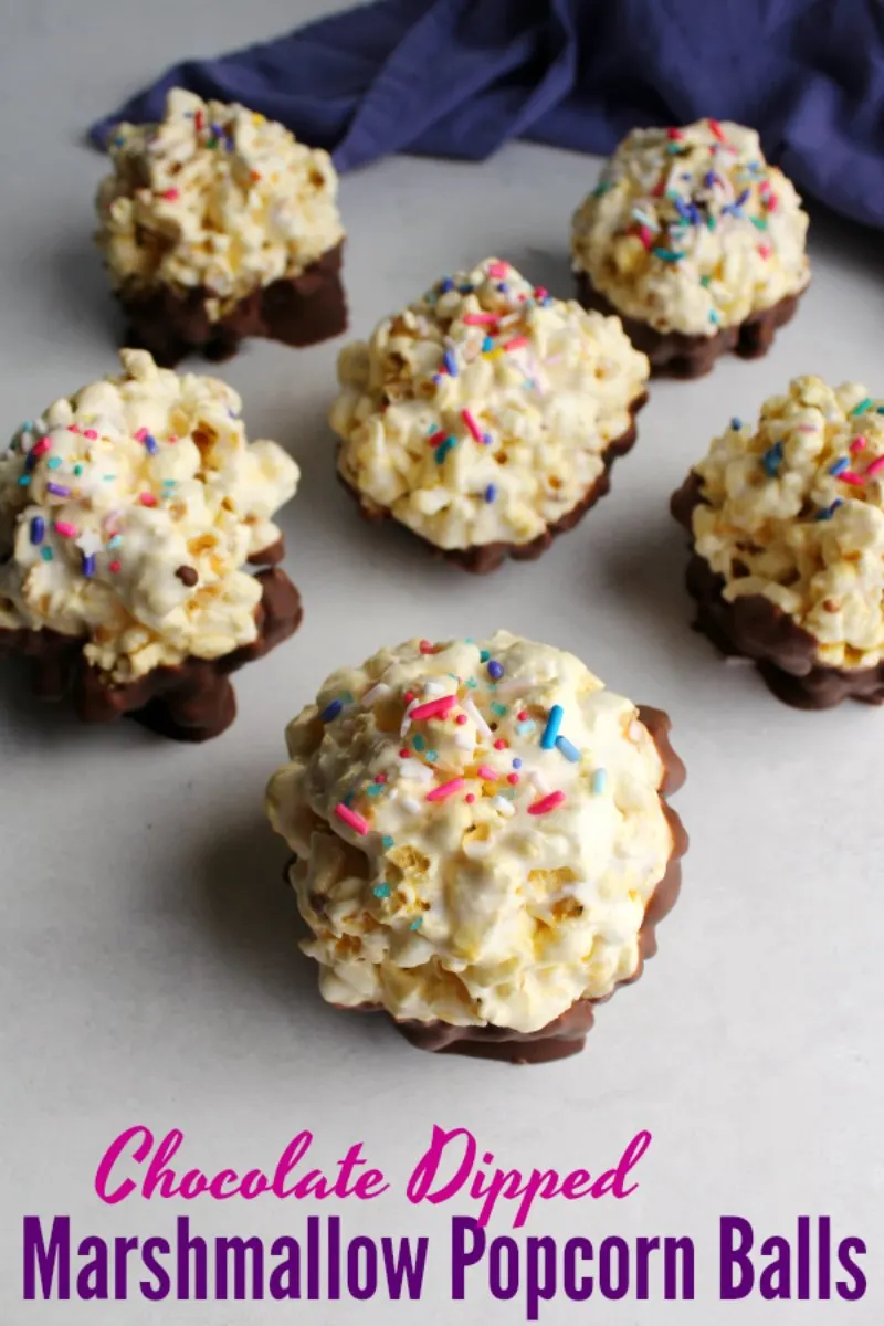 Marshmallow popcorn balls are a fun and easy treat that just take a few minutes and a few ingredients. Dip them in chocolate and top them with sprinkles for an extra festive and delicious treat!