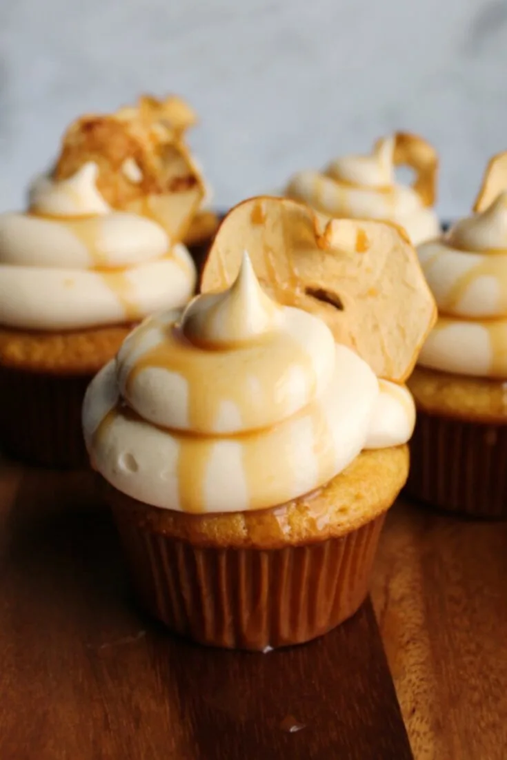 apple cupcakes with caramel frosting and apple chip garnish