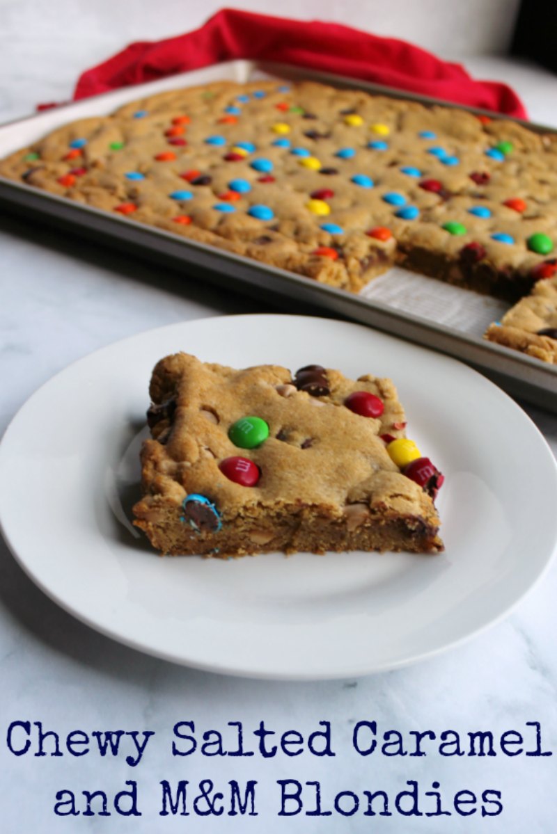 Chewy brown sugary blondies loaded with chocolate chunks, caramel undertones and topped with M&Ms. This big batch of bars is perfect for a party, carry-in or just because. 