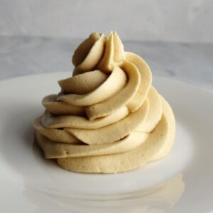 Swirl of brown sugar buttercream made with a custard base in the style of german frosting.