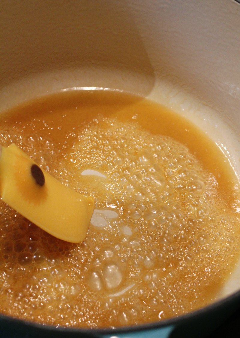 apple juice concentrate and butter cooked down ready for caramel.