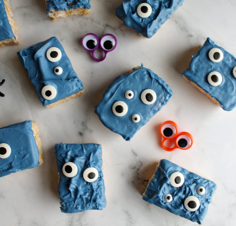 rice krispie treat topped with blue chocolate and lots of eyeball candies