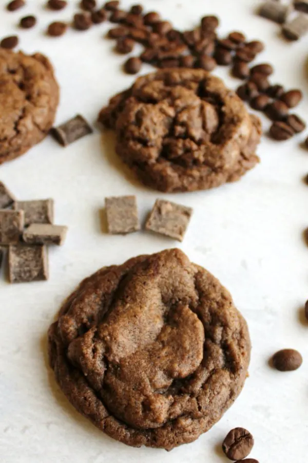 looking down on mocha chocolate chunk cookie with coffee beans and chocolate chunks