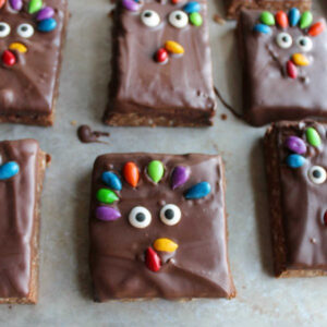 turkey decorated rice krispie treats with sunflower seed tail feathers, beak and gobbler.