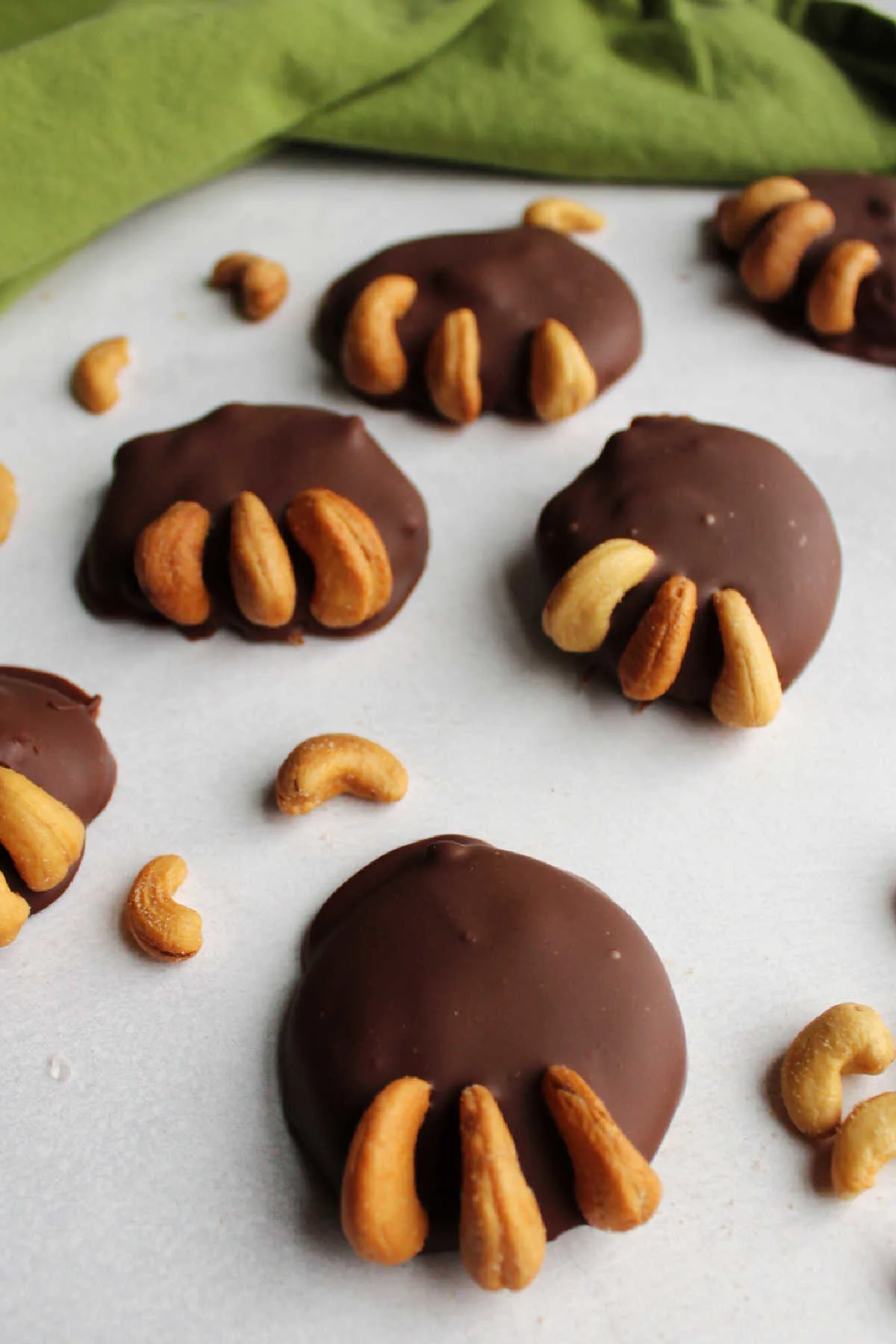 milk chocolate covered caramel and cashew bear paw candies.