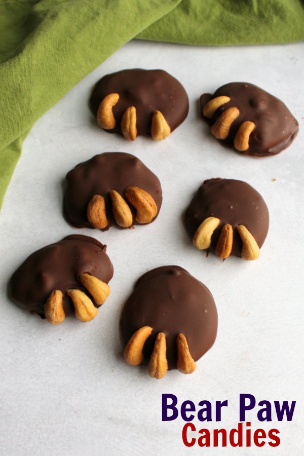 milk chocolate covered caramel and cashew bear paw candies .