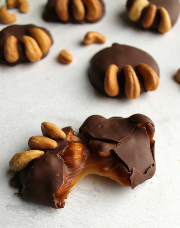 soft caramel center of milk chocolate covered cashew bear paw candy.
