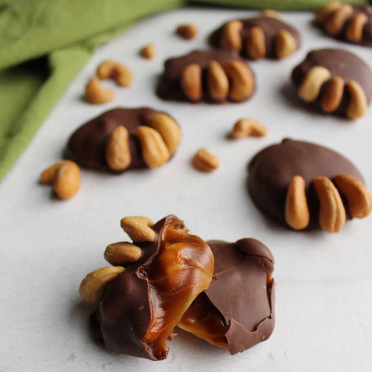 inside of bear paw candy with soft caramel showing and cashew claws.