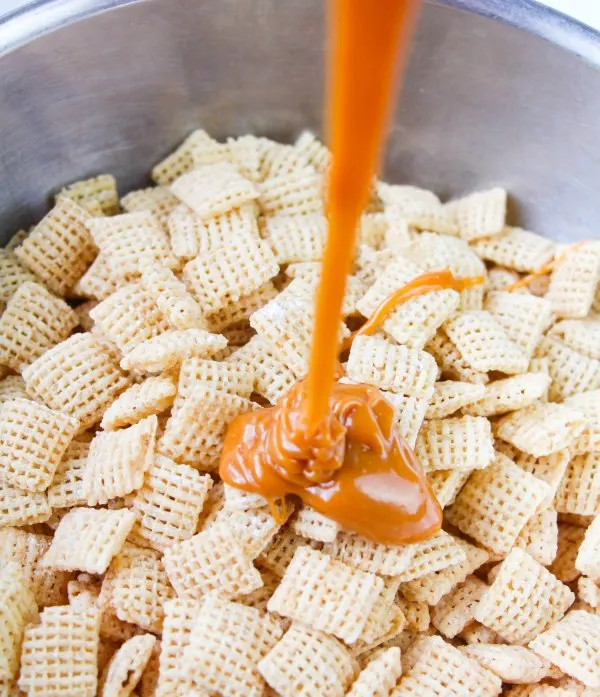 pouring melted caramel over cereal.
