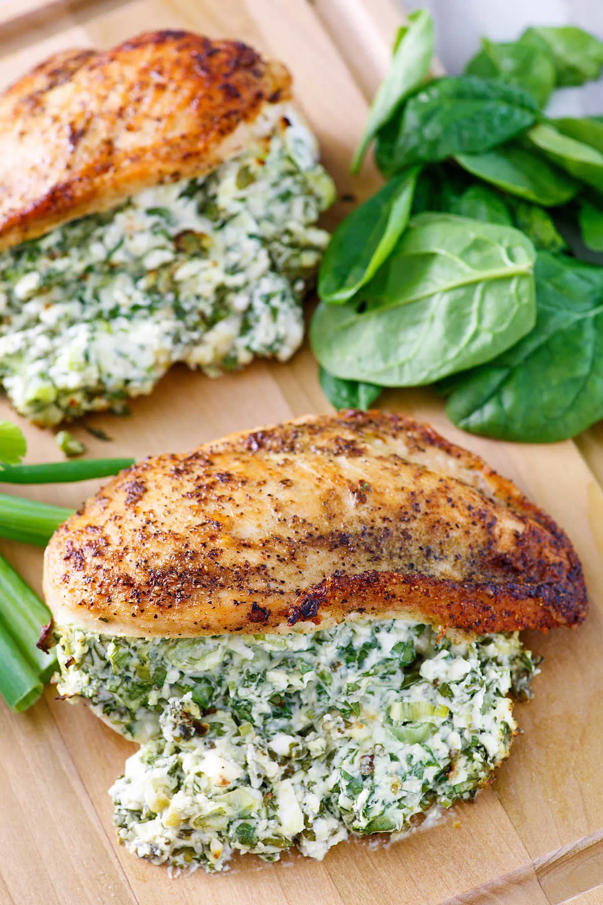 chicken breasts cooked to golden brown and stuffed full of cheese and spinach filling.