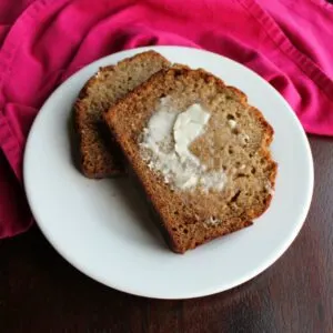 slices of banana bread with butter spread on them ready to eat