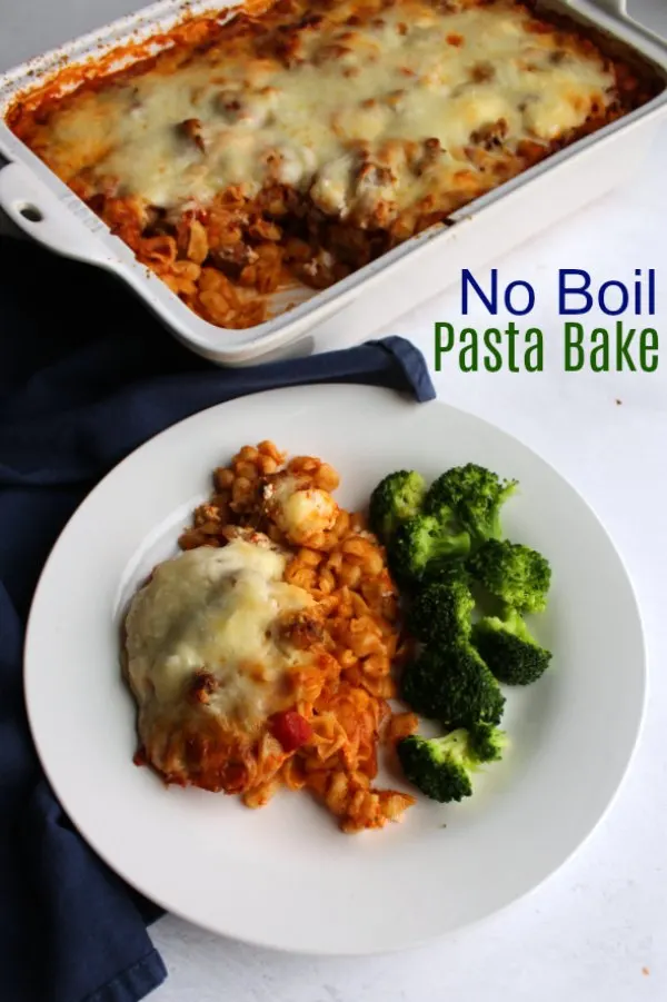 This dump and bake dinner has all of the flavor of your favorite pasta dishes with no time spent over the stove! It's the perfect mix of pasta, cheese, sausage and sauce without any of the effort!