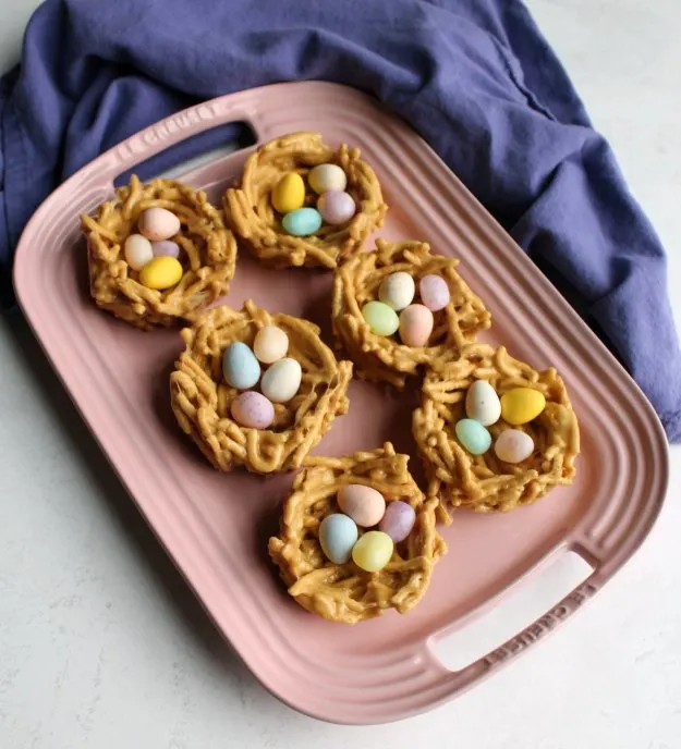 These cute edible nest treats are easy to make, no oven required! The no bake treats are always a hit and they are a great way to celebrate spring or Easter.  Add your favorite egg shaped candies to make them extra special.