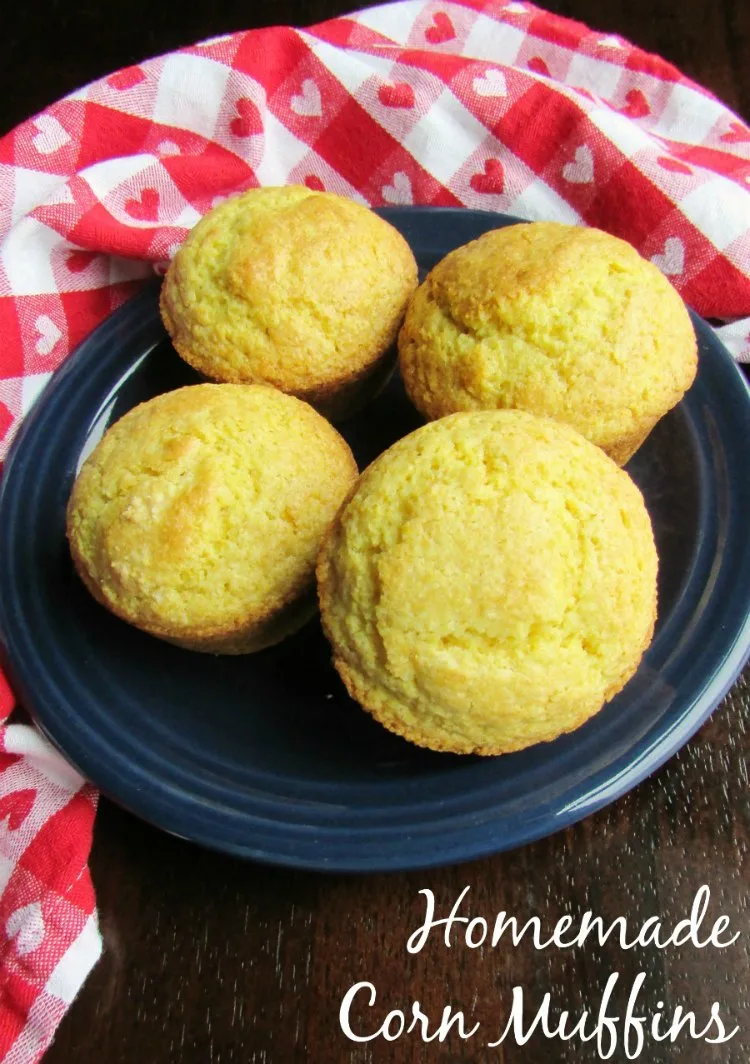 plate of corn muffins with red and white check napkin