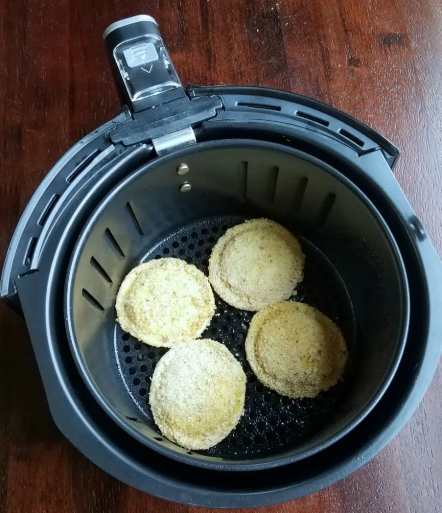 air fryer basket is bread crumb coated ravioli.