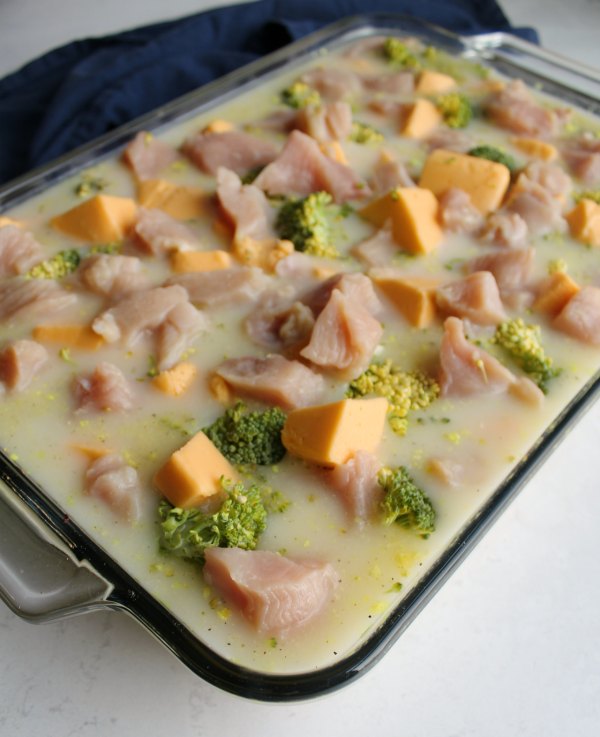 chicken broccoli and rice casserole, everything raw, ready to bake.