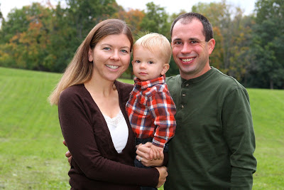 Family picture of Carlee, her husband and Little Dude as a small child. 