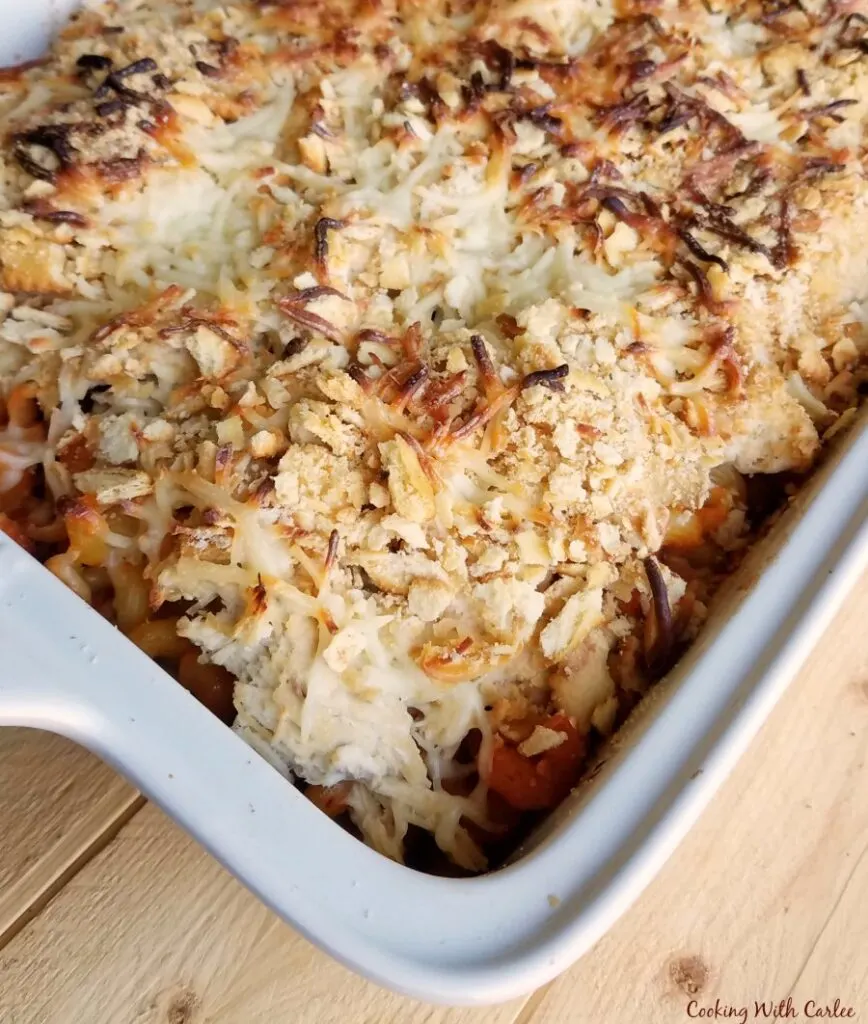 casserole dish filled with pasta, chicken and cheese.