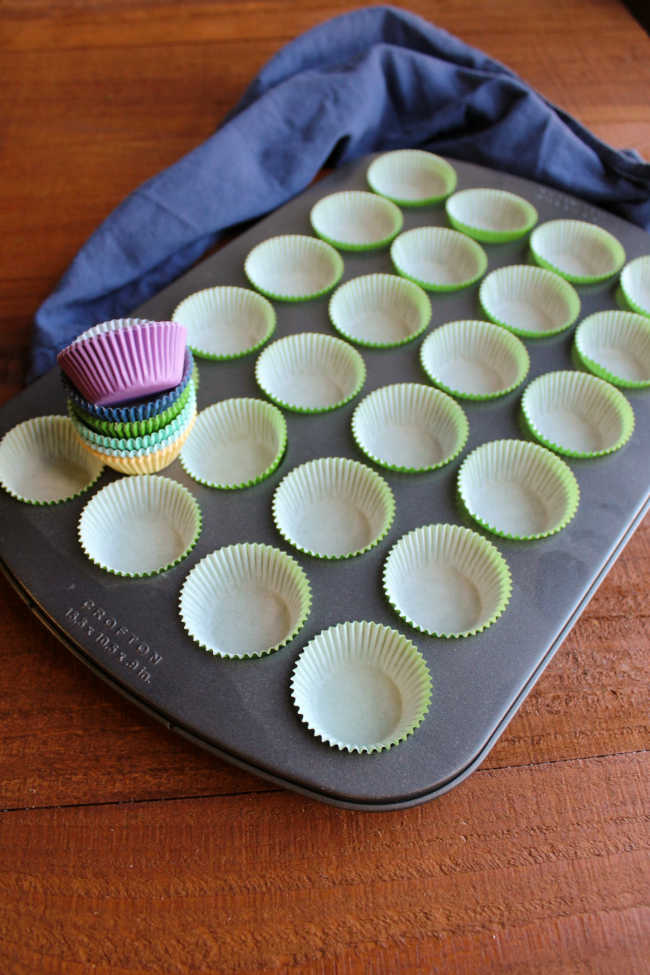mini cupcake tray filled with paper liners