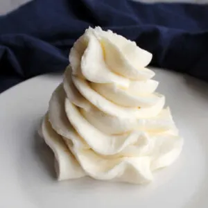 fluffy swirls of whipped cream cheese frosting