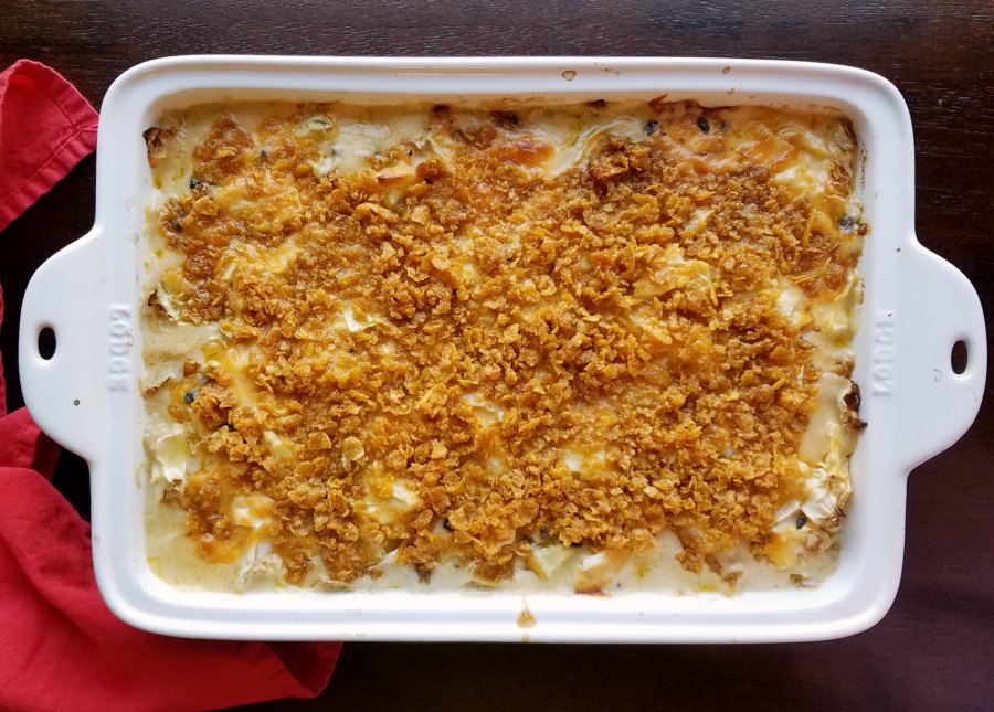 Cheesy cabbage casserole with butter cornflake topping fresh from the oven.