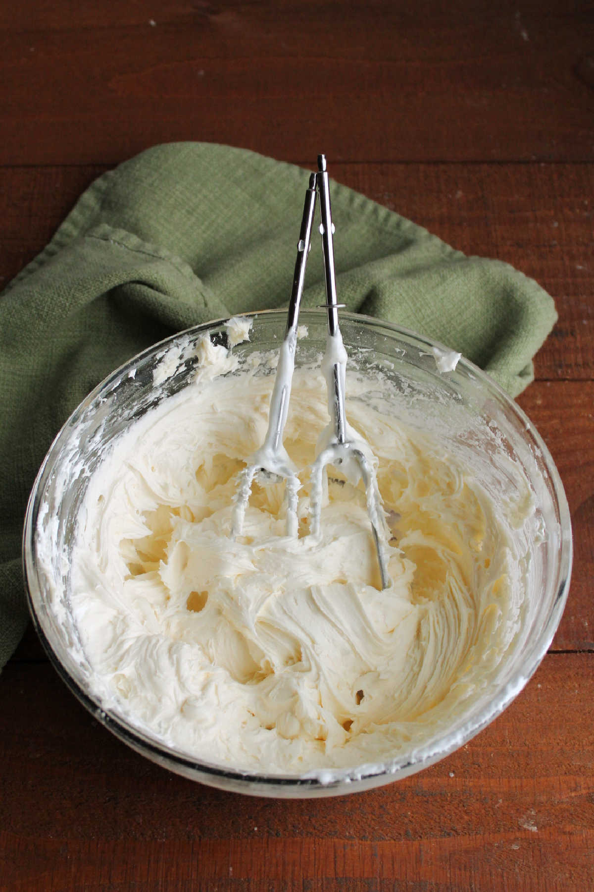 Mixing bowl of fluffy vanilla marshmallow fluff buttercream.