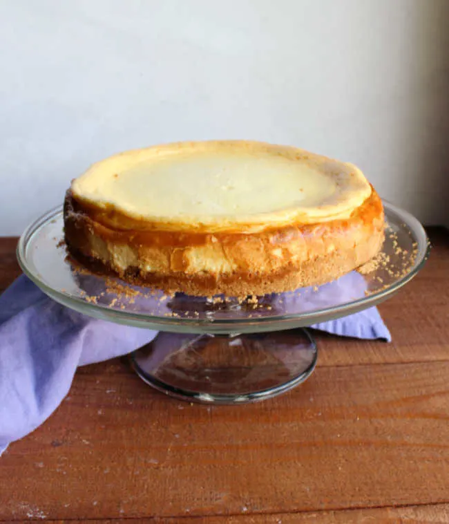 whole cheesecake on cake stand