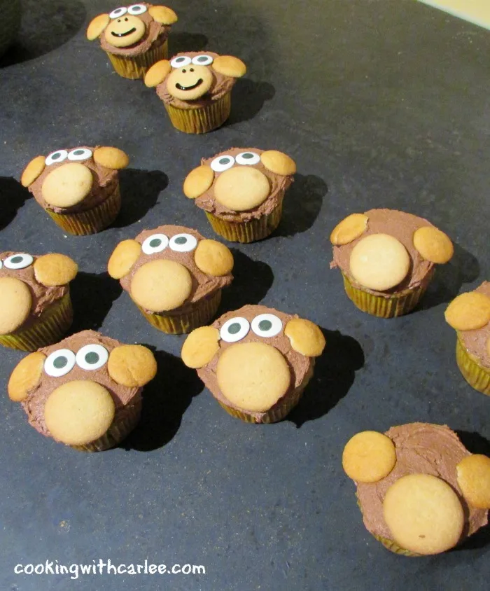 eyes added to cupcakes, starting to look like little monkey faces