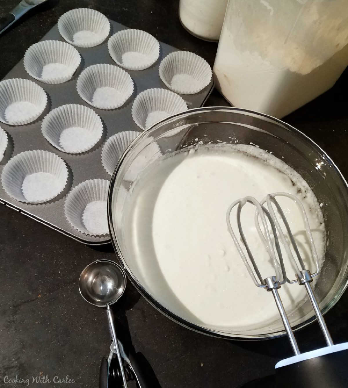 white cupcake batter ready to go into cupcake liners.