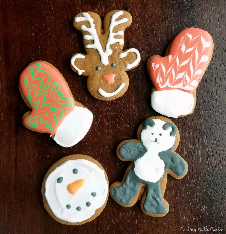 Christmas shaped gingerbread cookies decorated with royal icing.