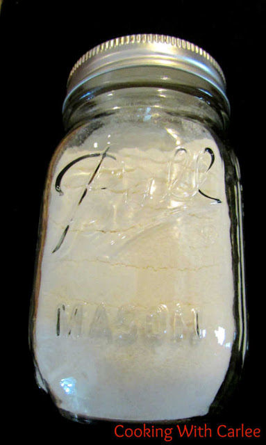 ball jar filled with white hot chocolate mix
