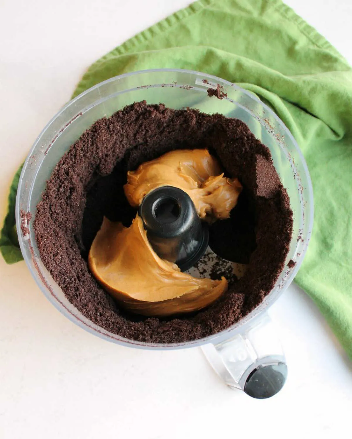 cookie crumbs and peanut butter in food processor.