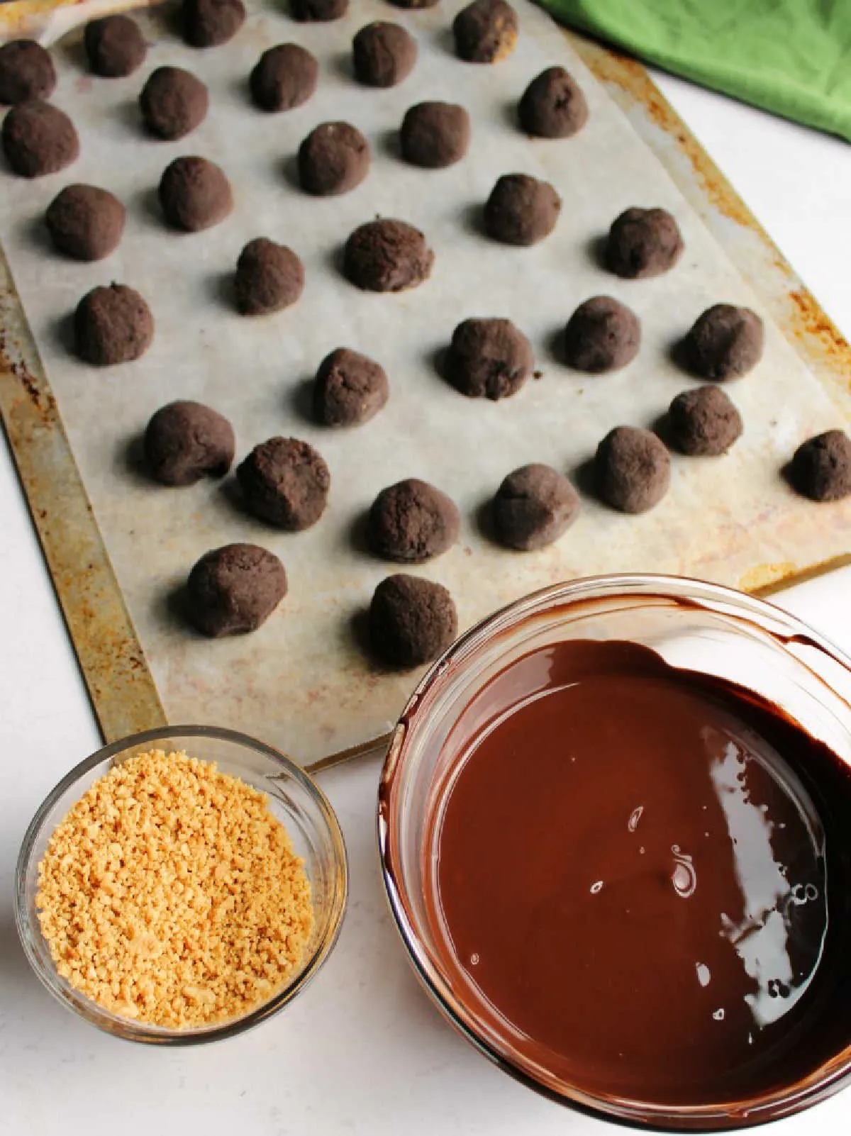 peanut butter oreo balls ready to be dipped in chocolate.
