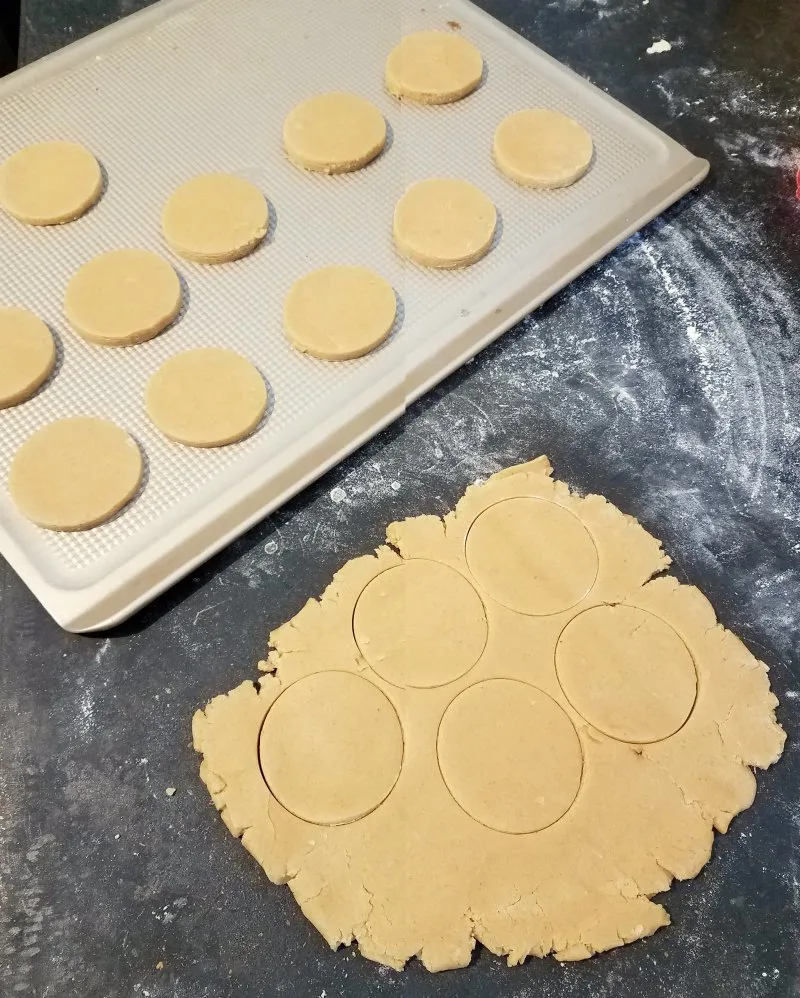 peanut butter dough rolled out and cut into circles.