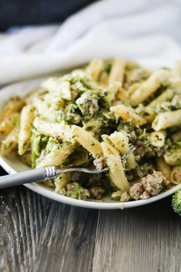 dinner plate with cheesy Italian sausage and broccoli one pot pasta