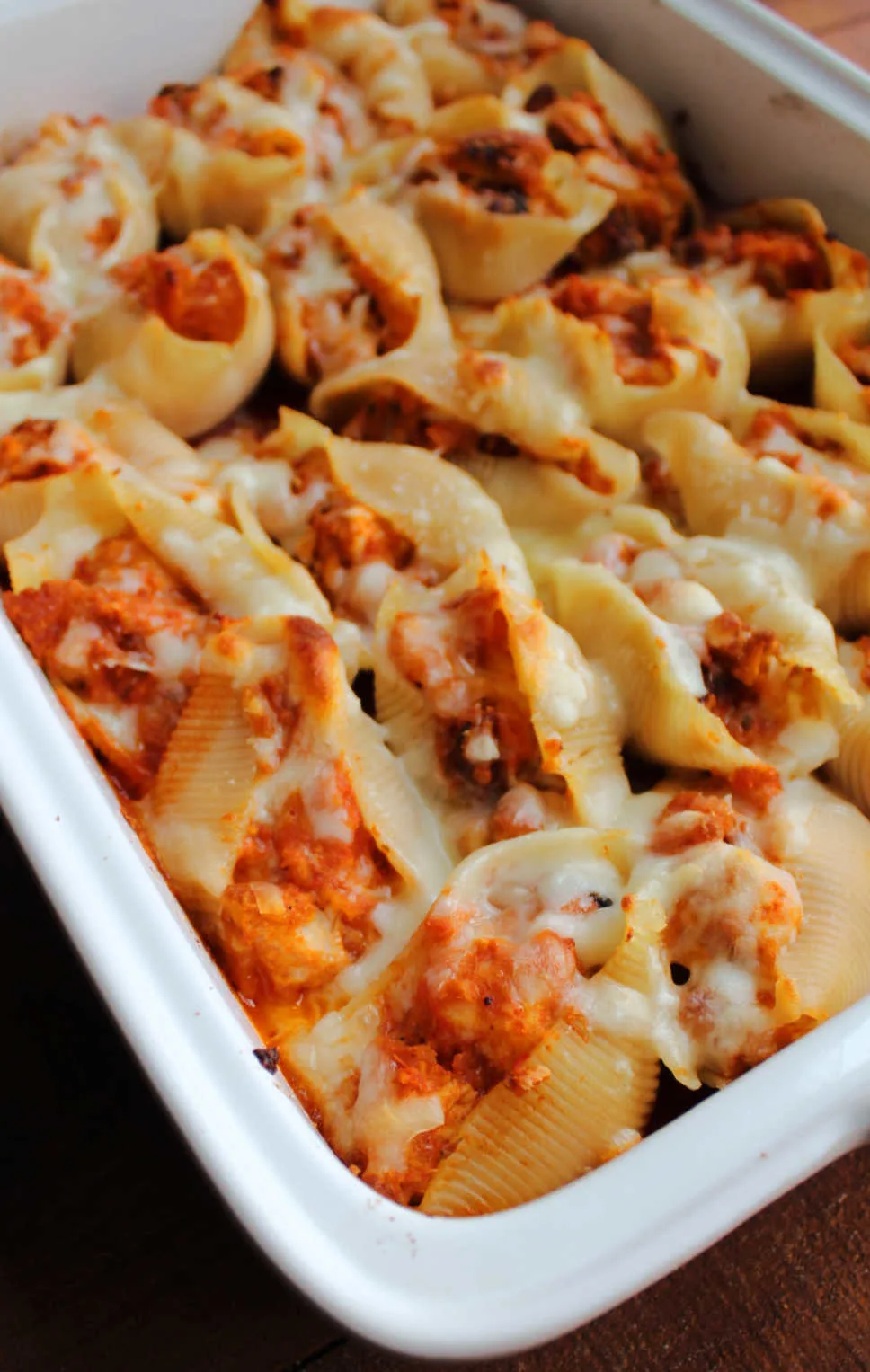 Pan of freshly baked chicken Parmesan baked shells.