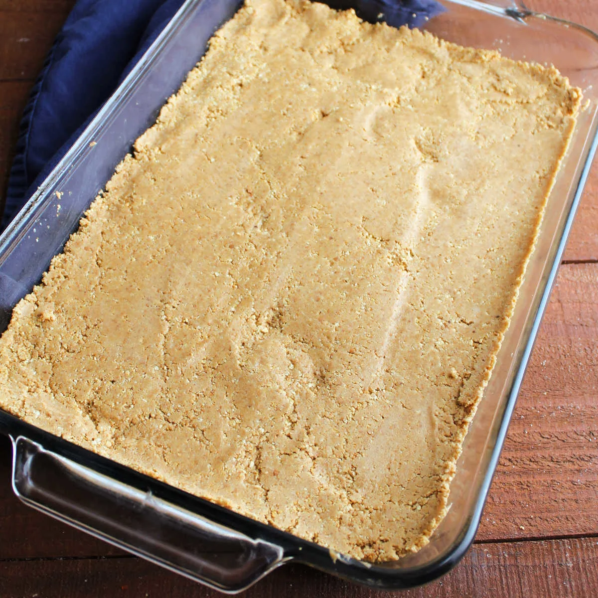 Peanut butter mixture pressed into pan.