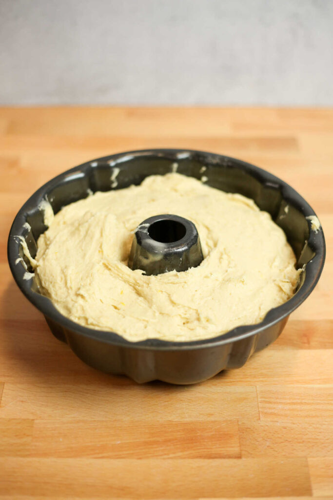 lemon cake batter in bundt pan ready to bake.