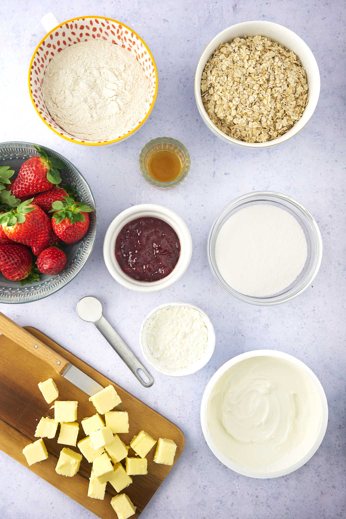 Ingredients for strawberry yogurt bars with oatmeal crumbs. 