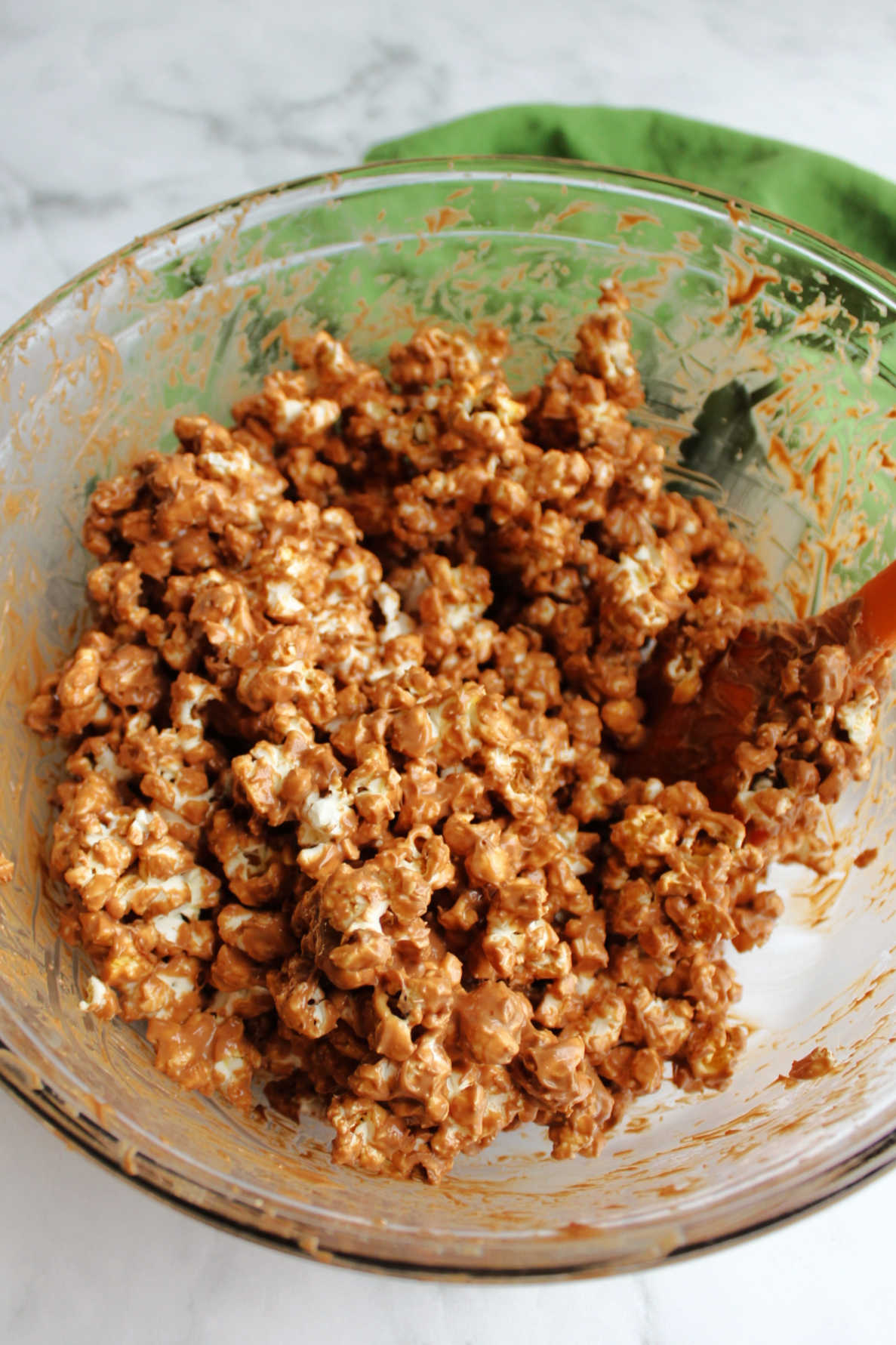 Popcorn coated in peanut butter and chocolate mixture.