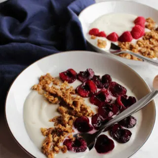 yogurt bowl with peanut butter and sweet cherries.