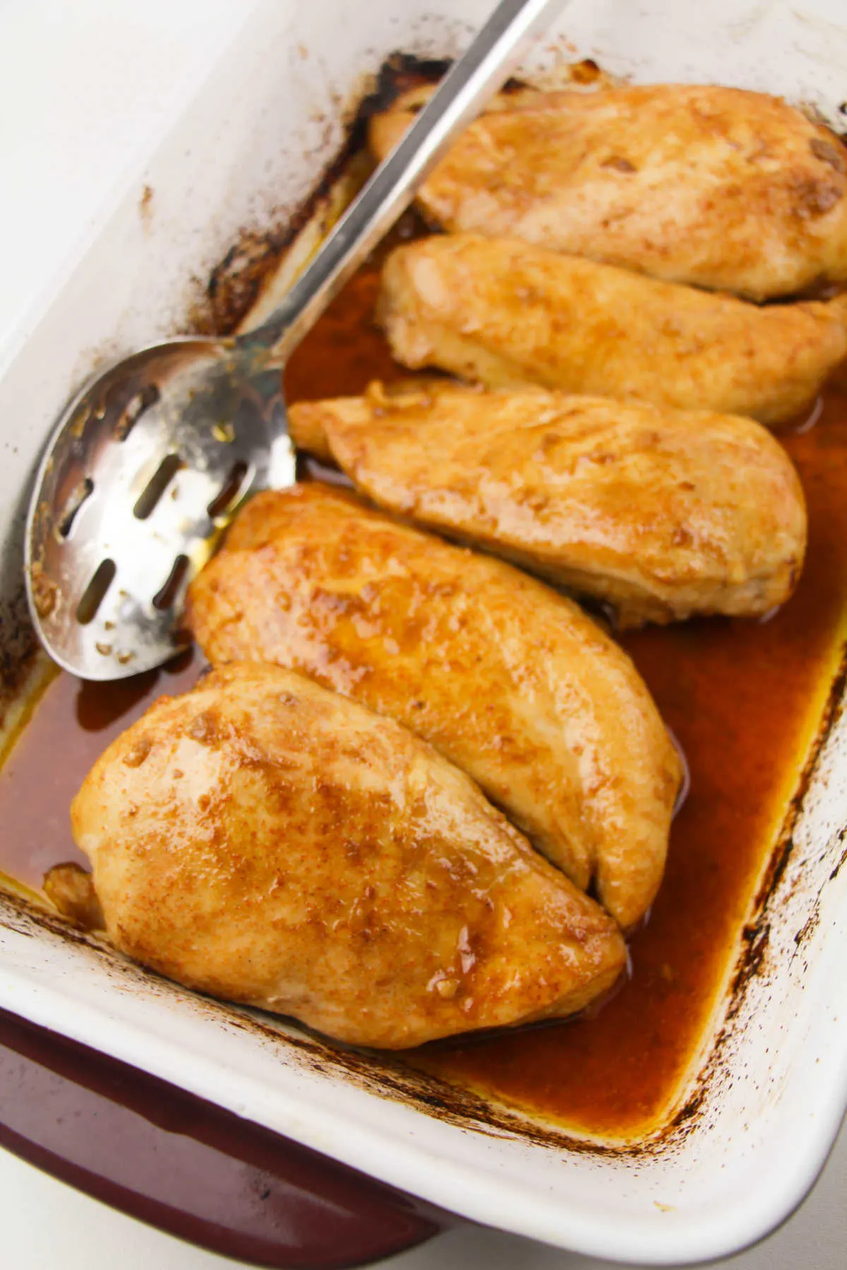 Pan of baked marinated chicken.