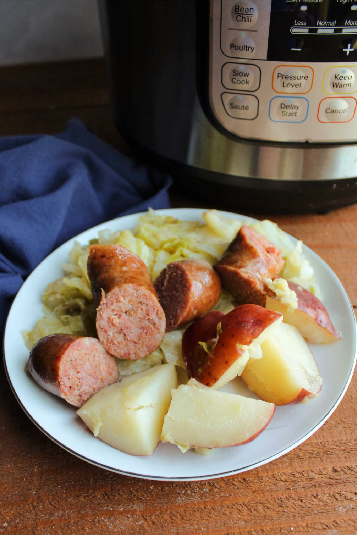 Dinner plate with cabbage, potatoes and keilbasa.
