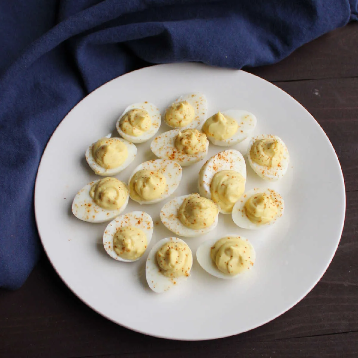 Plate filled with mini quail deviled eggs.