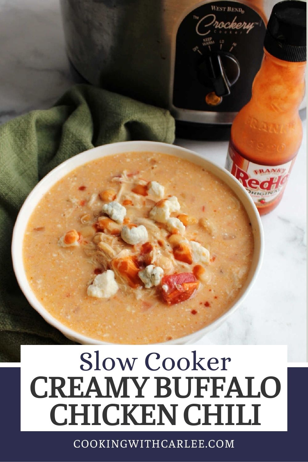 Creamy buffalo chicken chili is super simple to make with the help of your slow cooker. So it can cook all day while you do other things. It has just the right amount of buffalo chicken spice making it perfect for a weeknight dinner or a game day tailgating staple.