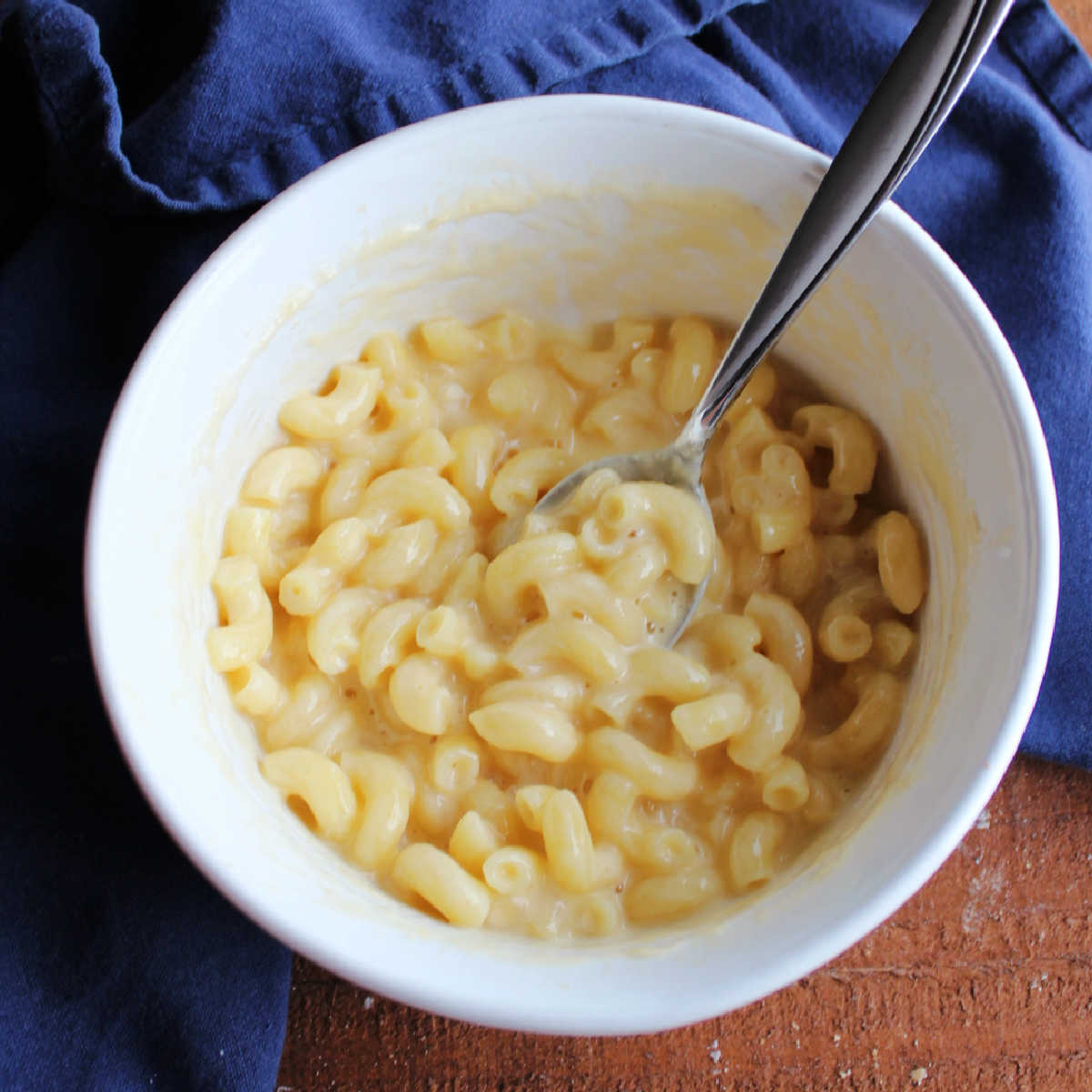 Bowl of easy single serve macaroni and cheese ready to eat.